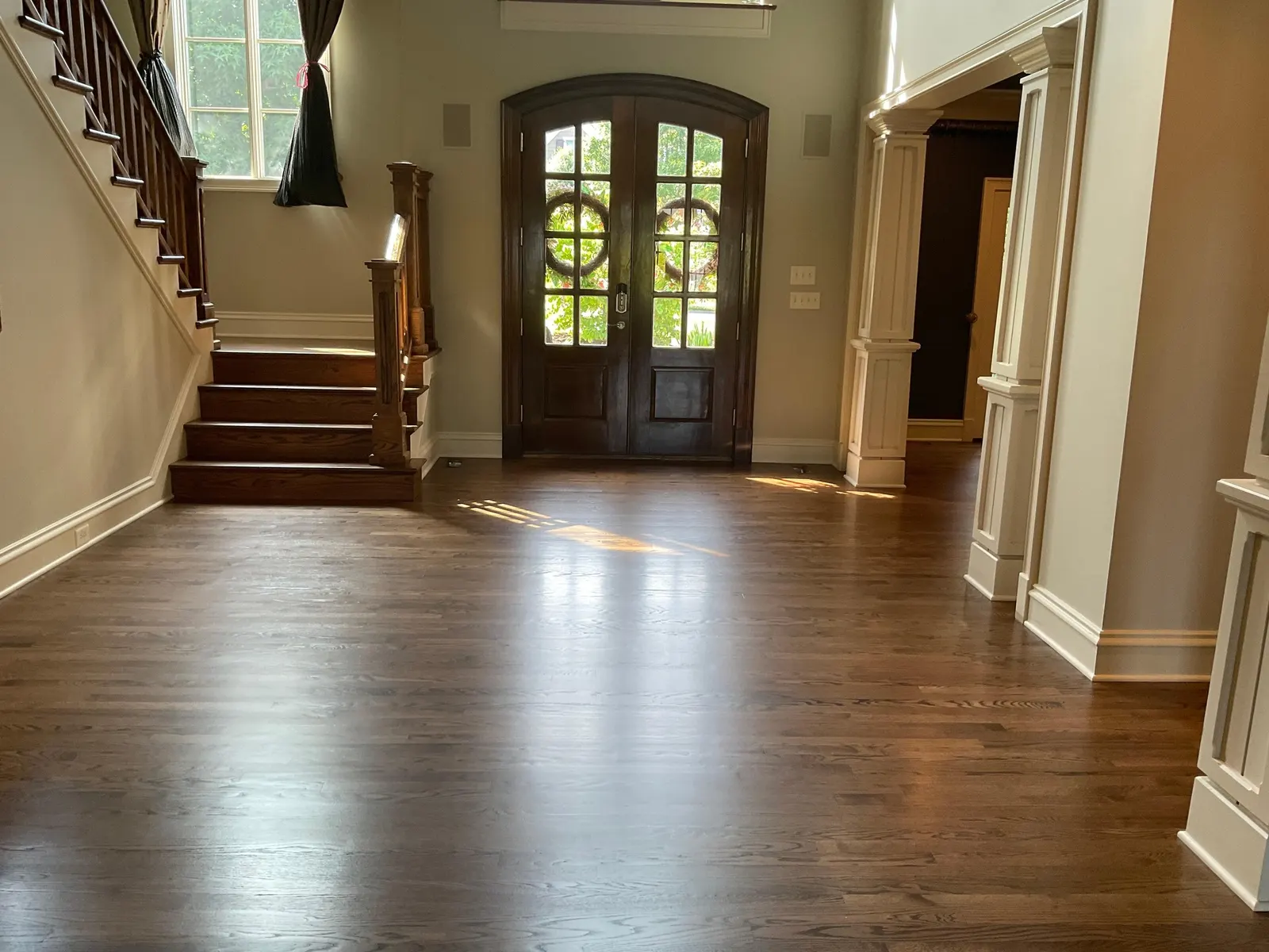 Hardwood floor refinishing in progress in a Knoxville TN home