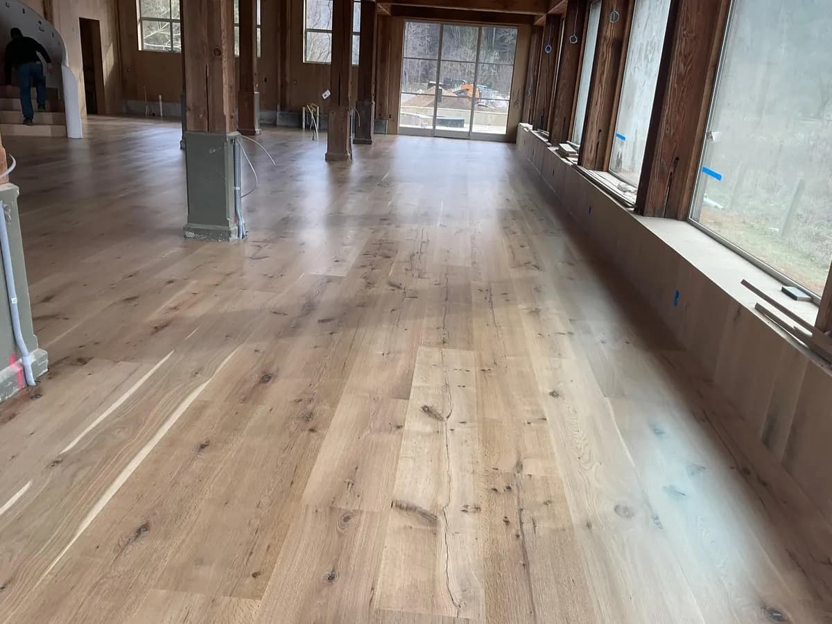 Beautiful wide plank hardwood flooring installed by Denton's