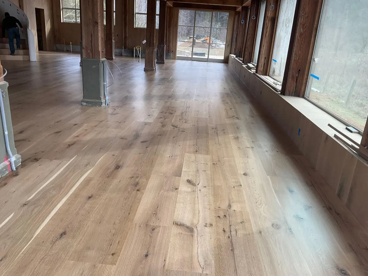 Beautiful wide plank hardwood flooring installed by Denton's