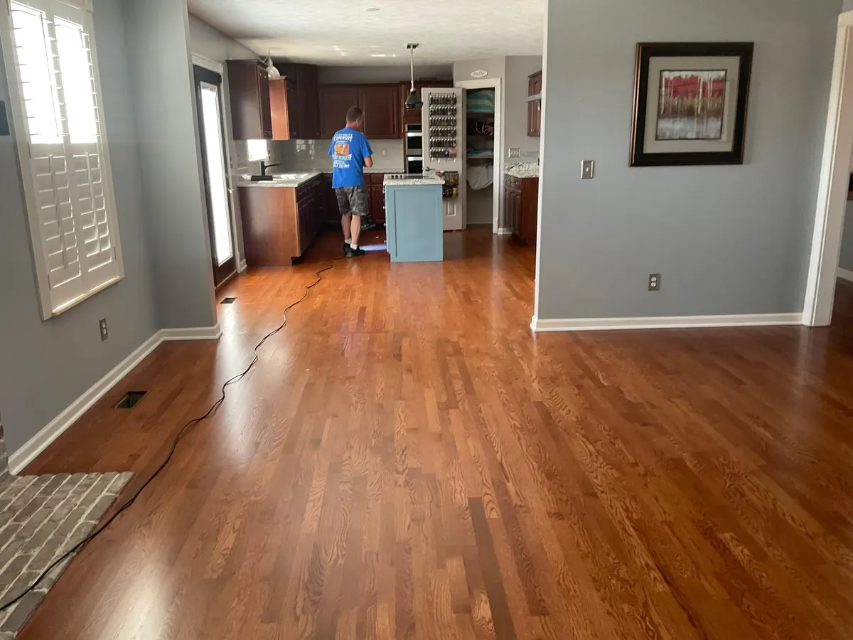 Denton's crew applying floor finish